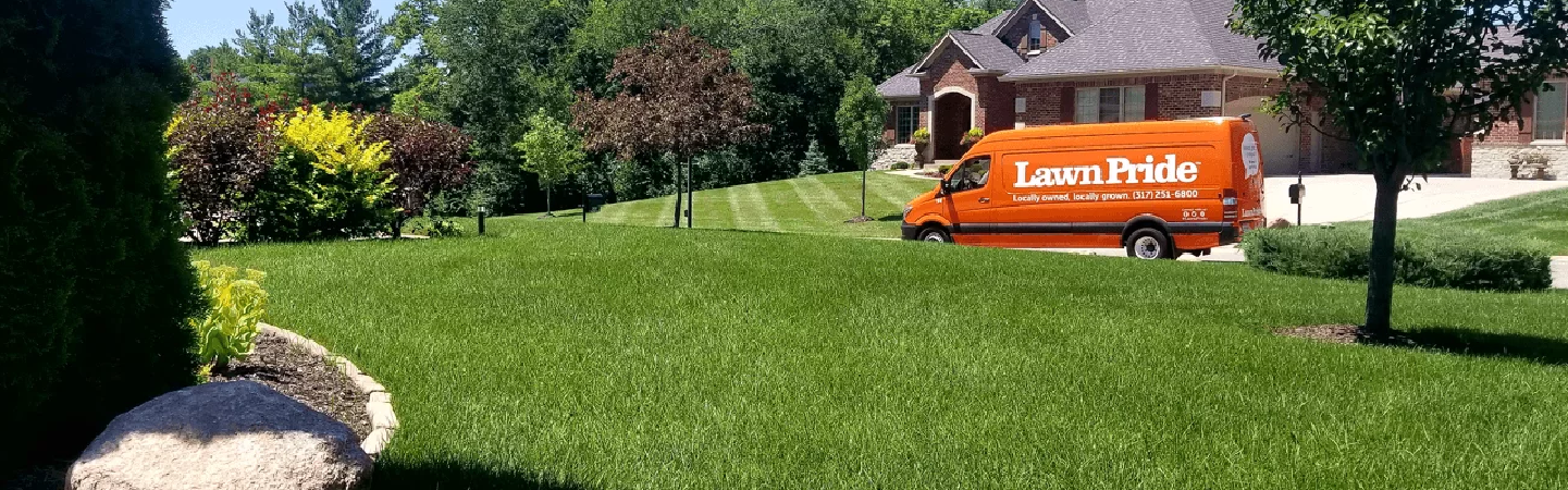 Lawn Pride branded van.