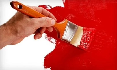 Brush Painting a Red and White Wall