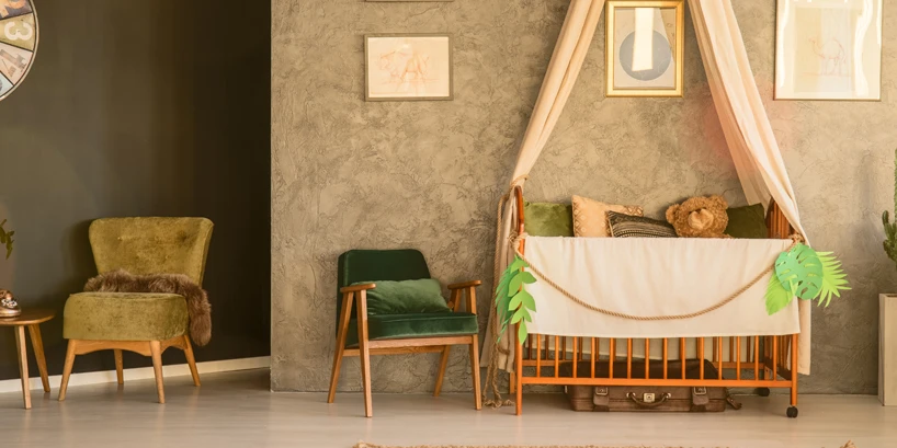 Photo of a warm brown and green baby nursery