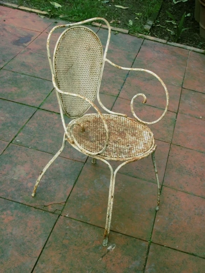Rusty iron patio chair