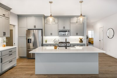 Gorgeous, modern kitchen cabinets with light gray paint job