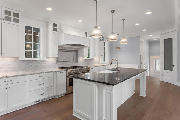 Beautiful, modern kitchen with white cabinets and kitchen island