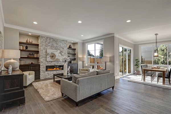 Gorgeous living room and dining rom with light gray interior paint job