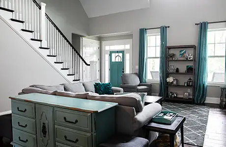 Living room with teal accents.
